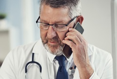 Physician-with-cellphone